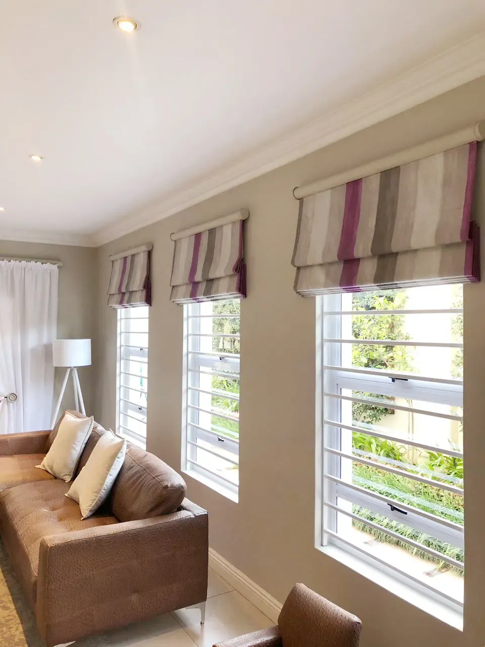 Horizontal steel bars fitted across a window.