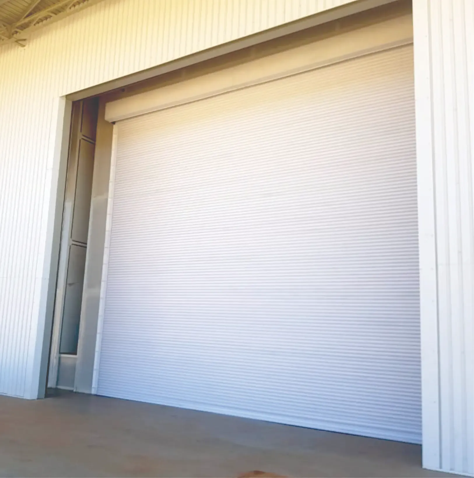Roller shutter door fitted to a shopfront or industrial opening.