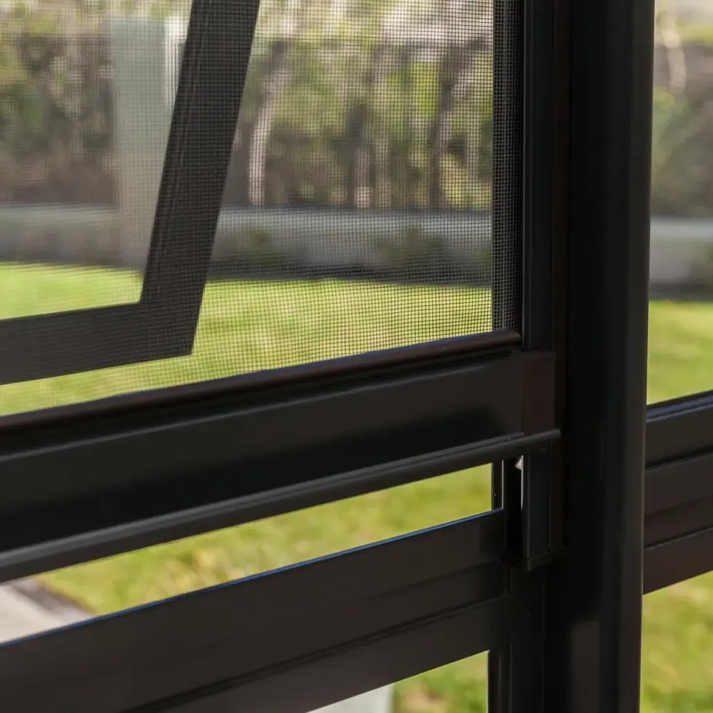 Mesh security screens fitted to a door or window.