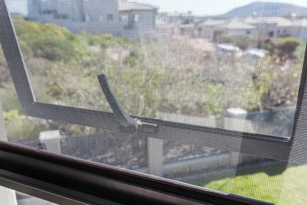 A mesh security screen installation.