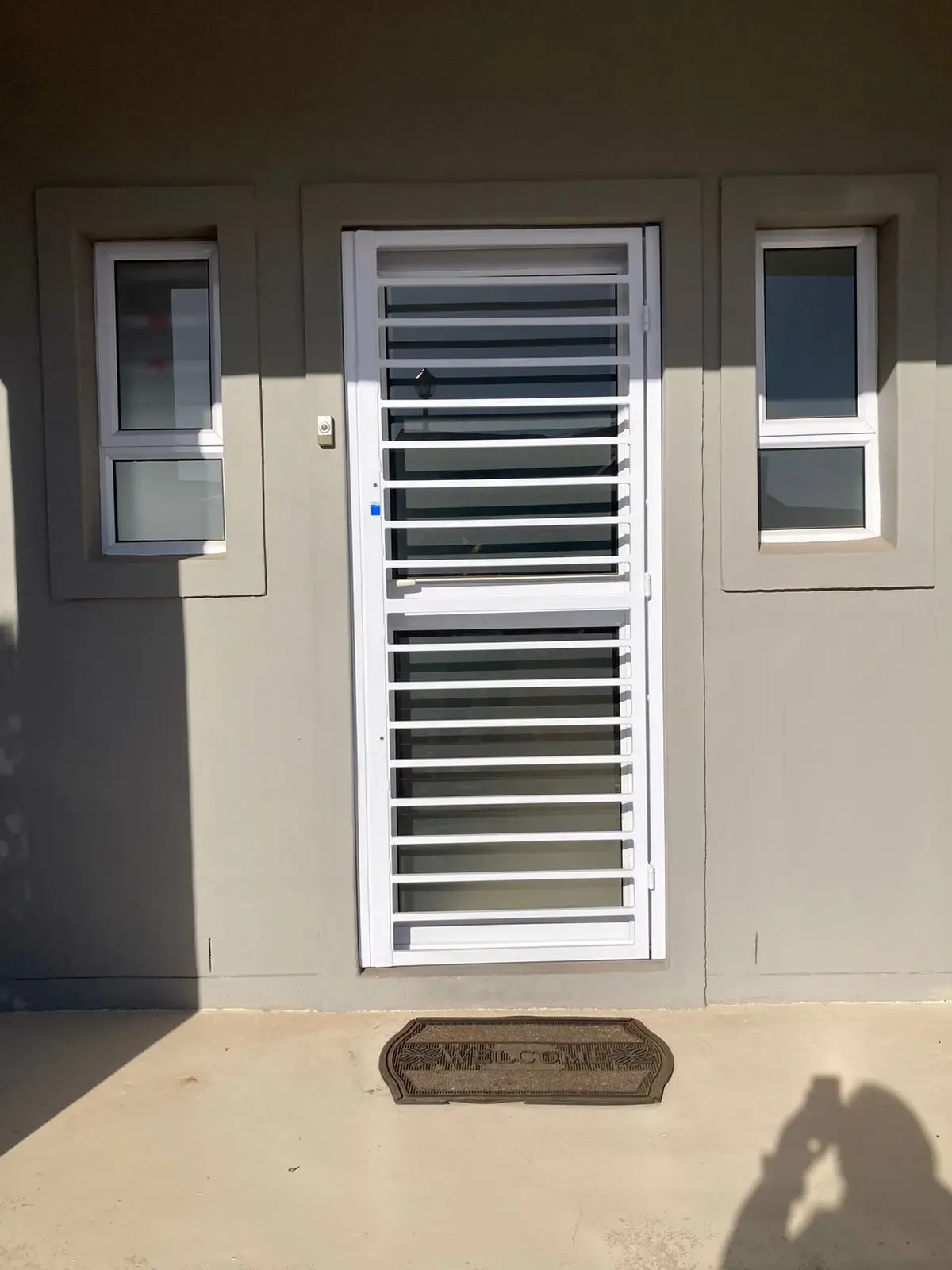 Hinged swing gate fitted to an entrance.