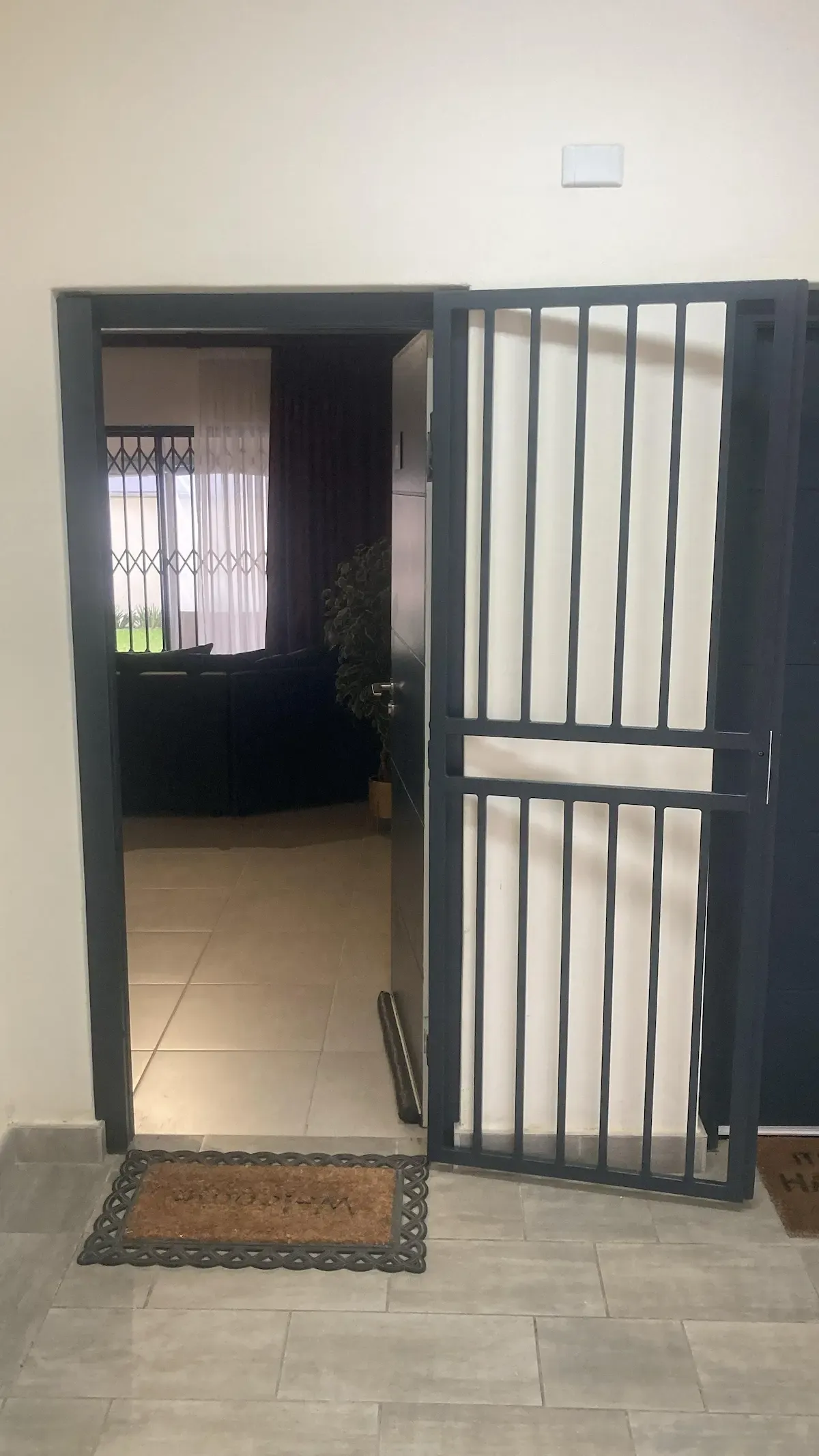 Hinged swing gate fitted to an entrance.
