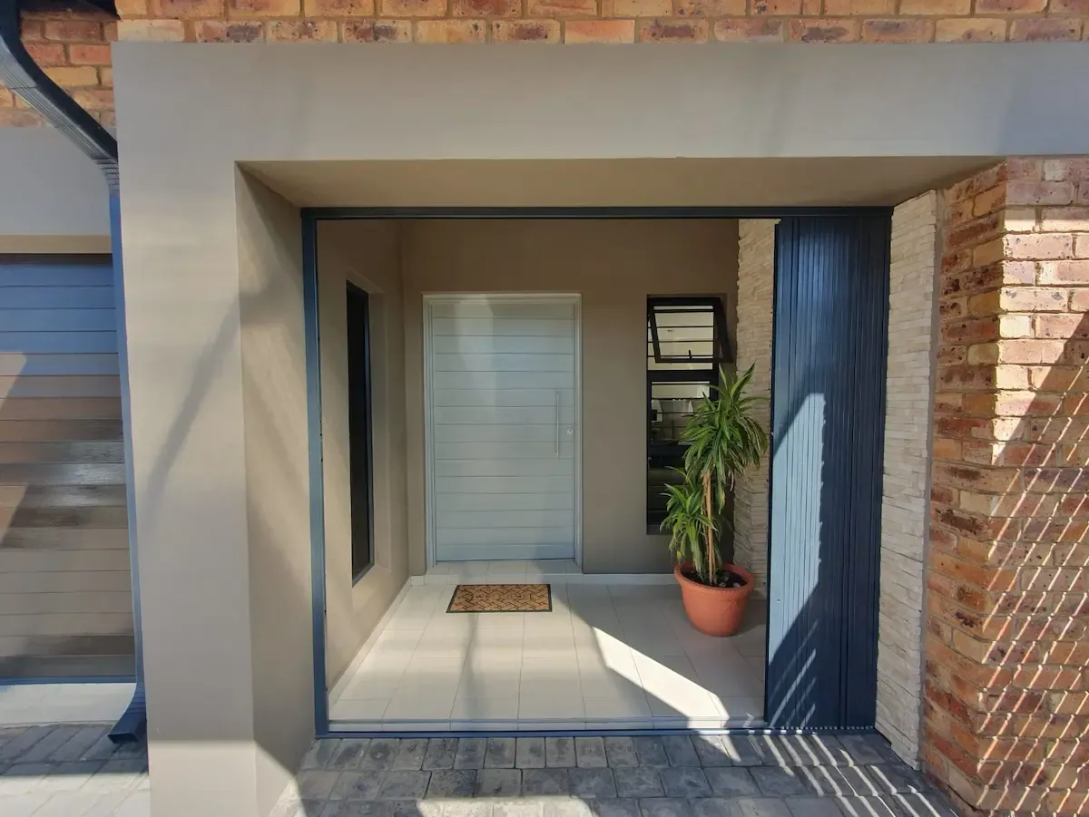 Retractable trellis security gate installation.