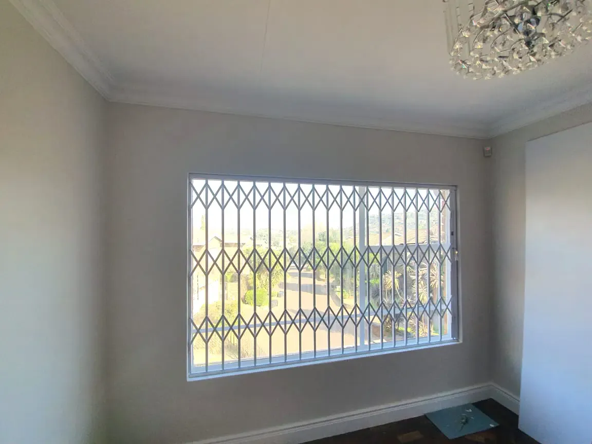 A window security fixture, fitted to a window opening.